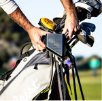 Scrubi golf club cleaner attached to a golf bag, featuring durable bristles for effective club cleaning on the course.