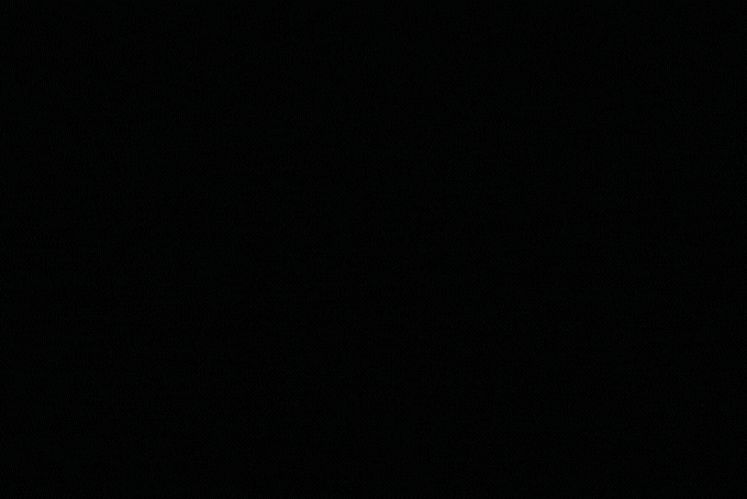 Scrubi golf bag bracket being attached to a golf bag.